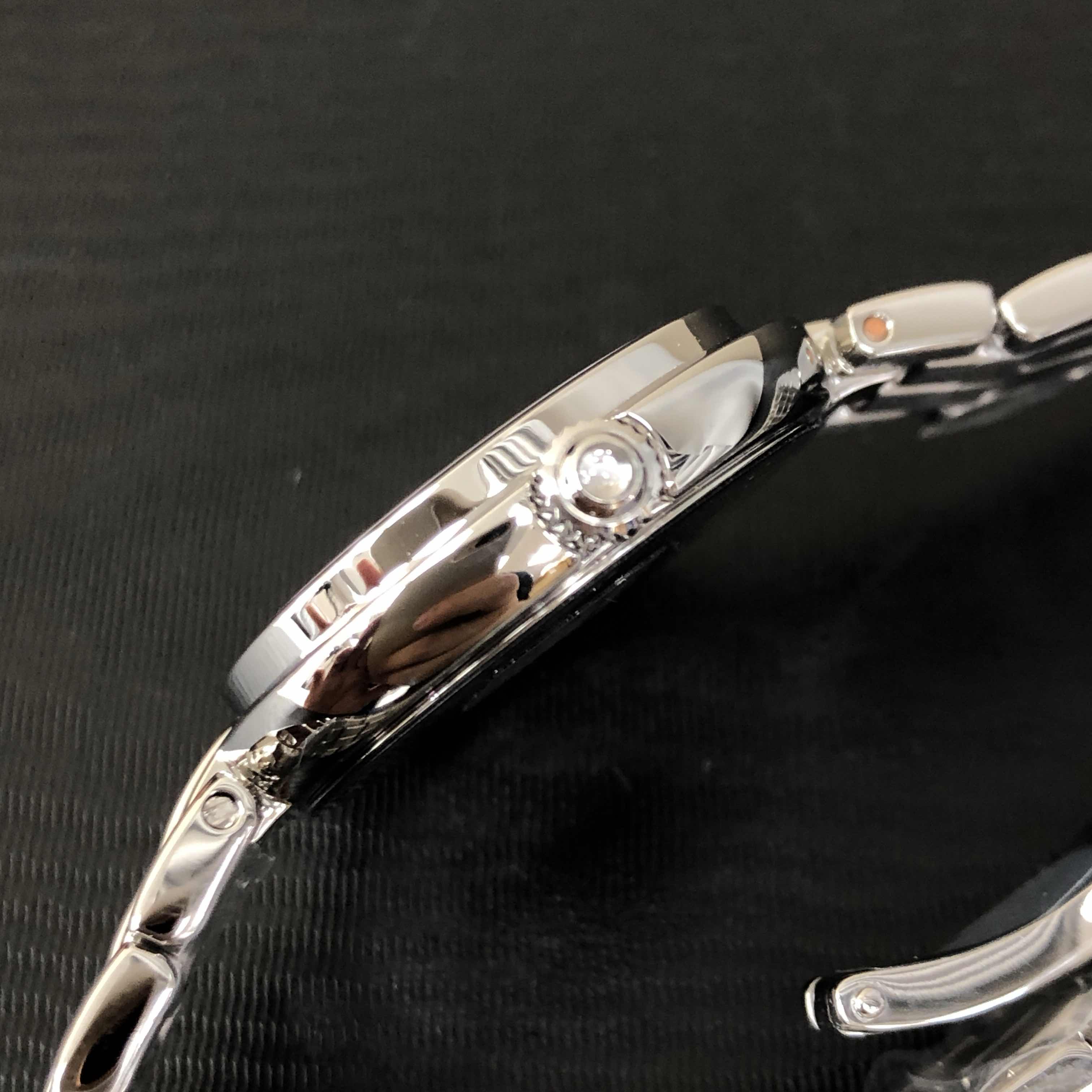 Tissot T094.210.11.121.00 8